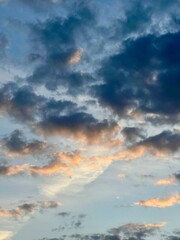 Obraz premium Dramatic colorful sunset sky. Clouds with sun rays. Cloudy landscape on the background of nature.