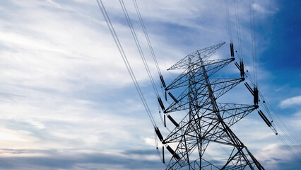 Close up bottom view electricity overhead power lines on blue sky in Jakarta Indonesia