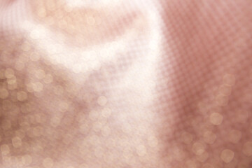 Fototapeta premium texture of the fabric, side, background of fabric in the highlight. golden color