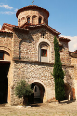 The facade of the Church St., Saint Archangels Michael and Gabriel in one of the courtyards of the Bachkovo Monastery, close to Plovdiv, Bulgaria