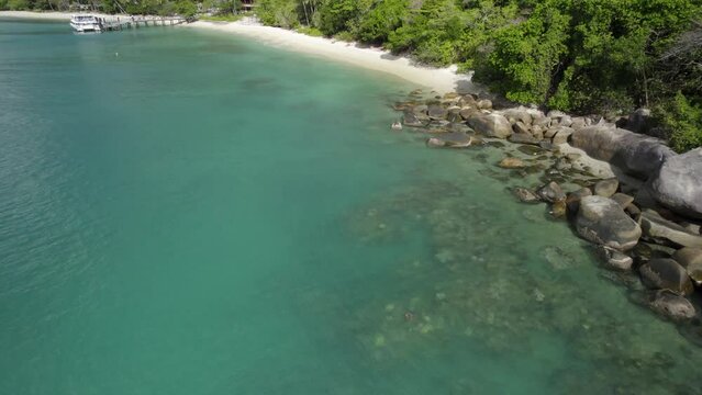 Aerial view of Nudey Beach with clear water and tropical paradise, Fitzroy Island, Queensland, Australia.