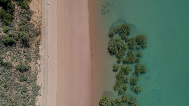 Aerial view of red sand beach with mangrove, Simpson Beach, Western Australia, Australia.