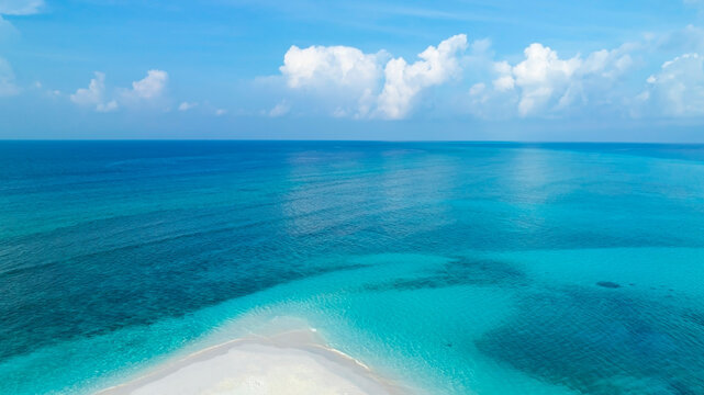 The soft wave water of the sea on the sandbar beach background