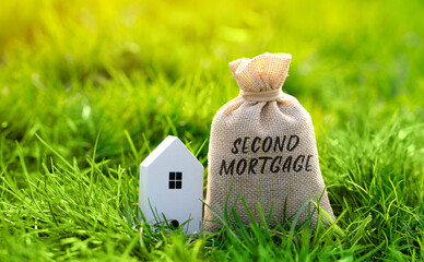 Second mortgage concept. Type of mortgage loan that is taken out on a property that already has a...