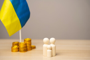 The concept of helping Ukrainian residents affected by the war. Financial support and donation....
