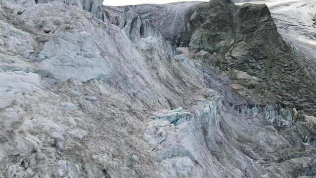 Sweeping aerial view of the rugged, icy terrain of Moiry Glacier in Switzerland