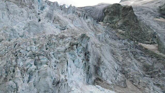 Moiry Glacier in Switzerland with rugged icy terrain and rocky landscape