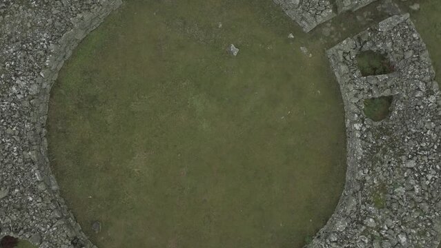 Aerial view of Edin's Broch ruins and stone circle in Scottish Borders, United Kingdom.