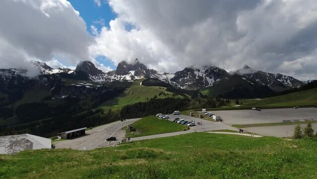 Tourists sightseeing on a mountain pass, Gurnigel pass in Switzerland