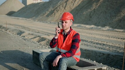 Work discussion with builders at construction site outside