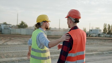 Conclusion of cooperation, greeting of builders concept