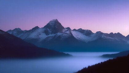A serene mountain landscape at sunrise with a clear sky and vibrant colors.