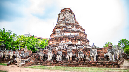Ancient lion statues located around an old Ayutthaya period pagoda at Wat Thammikarat, Phra Nakhon Si Ayutthaya Province, Thailand.  © Chay