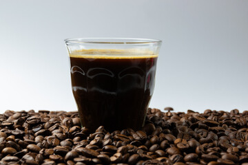 cup of coffee with beans