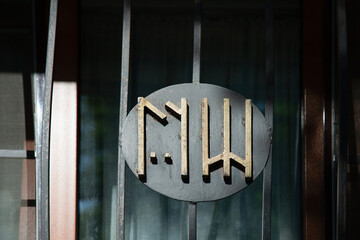 scandinavian runes on window bars . close up view . Magical home protection concept