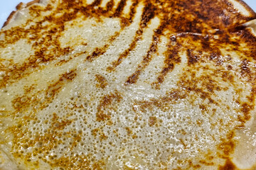 Close-Up of Delicious Golden-Brown Pancake with Crispy Edges for Breakfast or Brunch