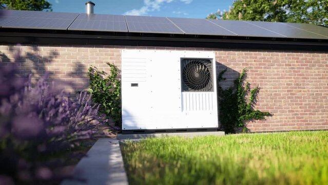 A heat pump with photovoltaic panels installed on the roof of a single-family house, along with a green ro, forms an eco-friendly heating and air conditioning solution for the property