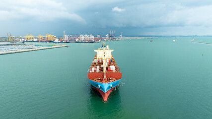 container ship sailing in sea, shipping business and industry service of cargo logistic import and export international freight transportation by container ship in open sea, aerial view