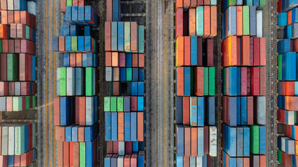 cargo containers top down aerial view. Containers at logistics terminal center. Cargo container...