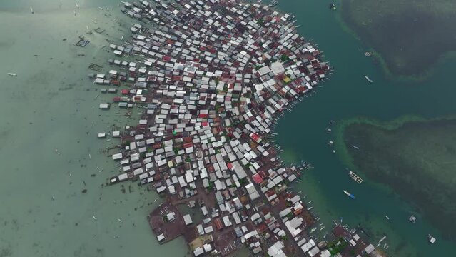 Aerial view of crowded fishing village on Bungin Island, Sumbawa, Indonesia.