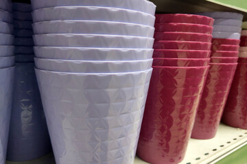 Colorful Stacked Plastic Vases in Pastel Purple and Pink for Home Decor