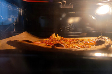 Homemade Pepperoni Pizza Baking in Oven - Authentic Italian Cuisine, Delicious Dinner, Comfort Food