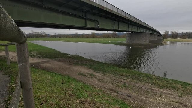 Bridge crossing the Danube River in Rheinfelden town on a cloudy day in Baden-Wurttemberg, Germany