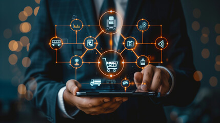 Businessman holding tablet with icons for a logistics or online global transportation technology