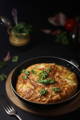Traditional Spanish dish tortilla on the table	