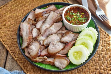 Thai Grilled Pork Neck with spicy dipping sauce,Isan food
