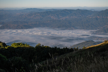  beautiful view of mountain with clouds at sunrise (Doi Inthanon National Park, Chiang Mai), soft focus