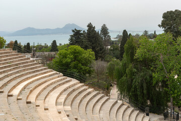 The Roman theatre, part of the ancient archaeological ruins of the Phoenician city of Carthage overlooking the Gulf of Tunis and the Mediterranean, Tunis, Tunisia.