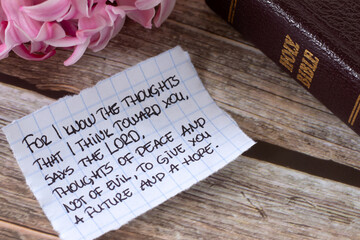 Inspiring handwritten text about God's future plan, hope, peace, and love for Christians with holy...
