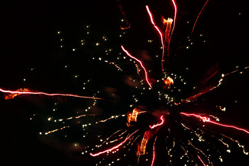 An artistic picture of New Year's fireworks in the dark sky. Long exposure, bokeh, abstract....