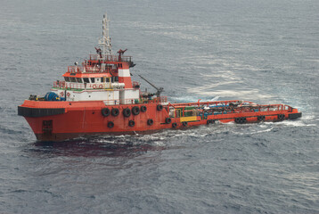 Supply boat transfer crew cargo to oil and gas offshore field