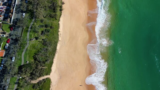 Aerial footage of Buddina coastal suburb in the Sunshine Coast Region in Queensland, Australia