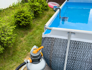 Garden pool with sand filter system