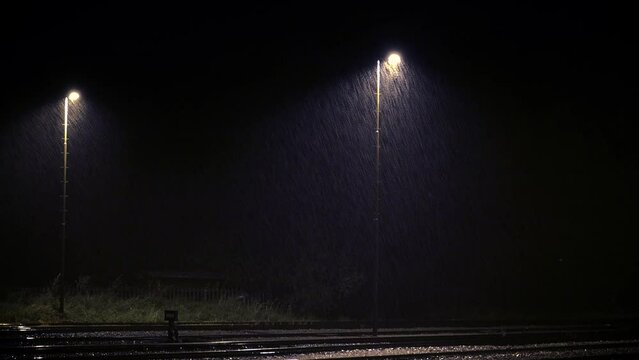 Heavy Rain in the Night on train Station Suburbs 