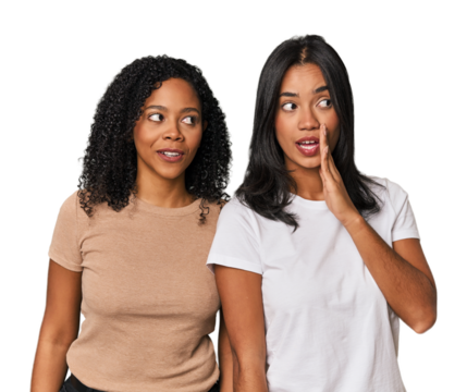 Young Latin friends in studio is saying a secret hot braking news and looking aside