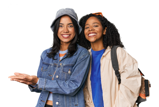 Latin friends ready for vacation holding a copy space on a palm.