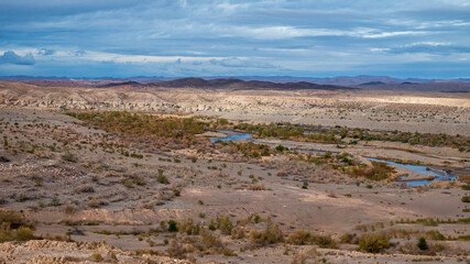 Desert landscape near Lake Mead, characterized by its arid terrain with sparse vegetation.