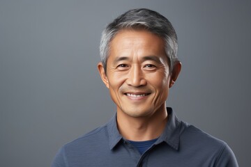 Gray Background Happy asian man. Portrait of older mid aged person beautiful Smiling boy good mood Isolated on Background