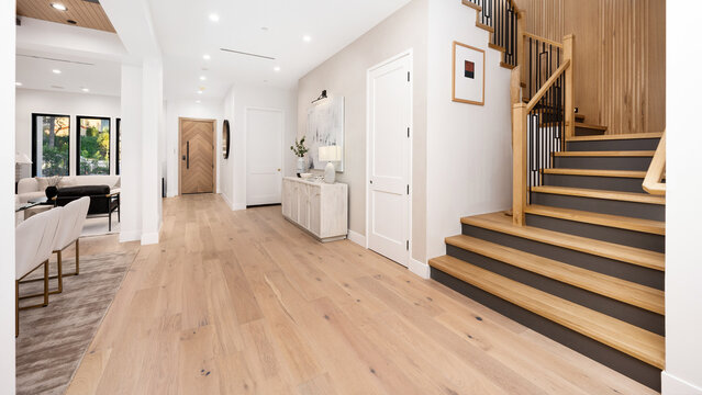 Hall with a staircase leading to the second floor of a home