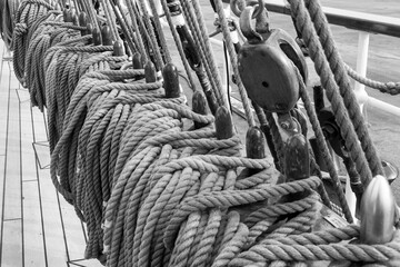 Sailboat sail ropes. Naval ropes. Black and white image. 