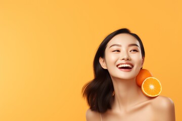 Orange background Happy Asian Woman Portrait of young beautiful Smiling Woman good mood Isolated on Background Skin Care Face Beauty Product Banner with copyspace
