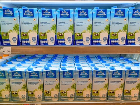 Jakarta, Indonesia - May 19, 2024: View of UHT milk displayed in a supermarket. Oldenburger Oldenburger fullcream milk on shelf.
