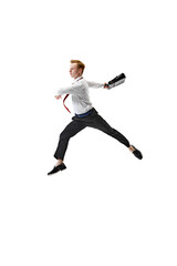 dynamic business professional dressed smart casual outfit jumps in motion with briefcase against white studio background. Concept of business, work and study, hobby, freelance, office. Ad