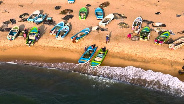 Aerial view of colorful boats, fishermen taking a boat to water, Negombo, Sri Lanka.