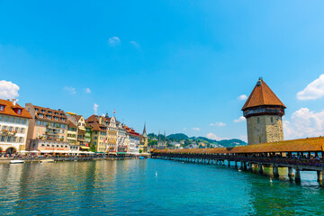 City of Lucerne with Chapel Bridge Tower in a Sunny Day in Switzerland.