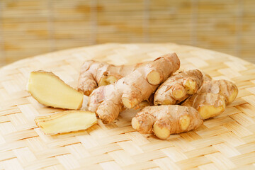 Fresh young turmeric on monochrome background